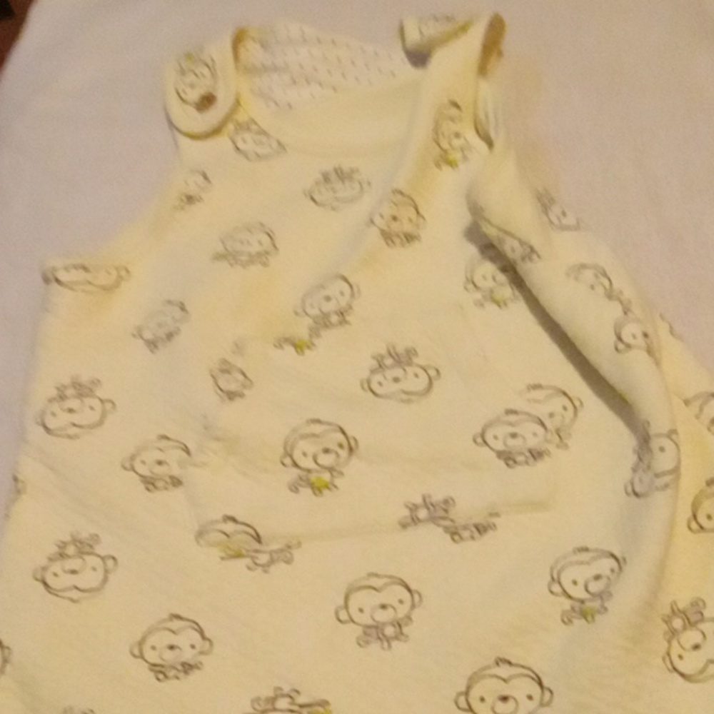 Baby wrap with monkeys on cream color